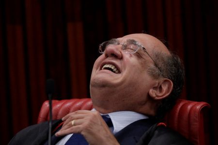 President of the Superior Electoral Court Gilmar Mendes smiles during a session where Brazil's electoral court will take up a 2014 case that could unseat President Michel Temer, in Brasilia, Brazil June 9, 2017. REUTERS/Ueslei Marcelino